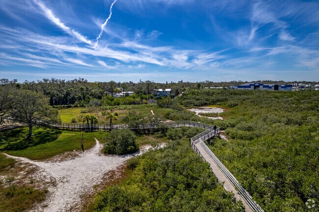 Take a stroll along the wood planked boardwalk at John R. Booner Nature Park.