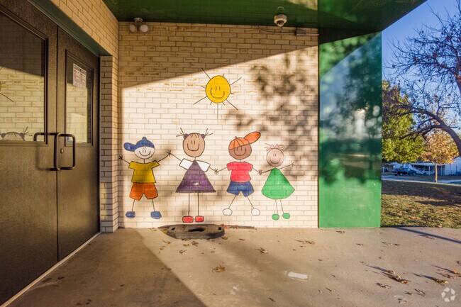A colorful mural warmly greets students for another day at school at McKinley Elementary School.