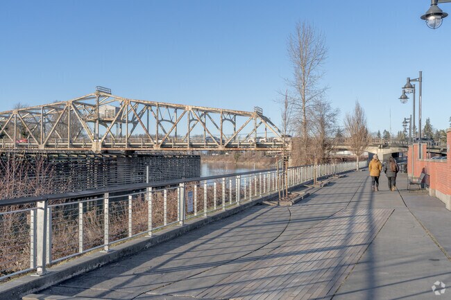Enjoy a relaxing walk with a friend at Skagit Riverwalk in Mount Vernon.