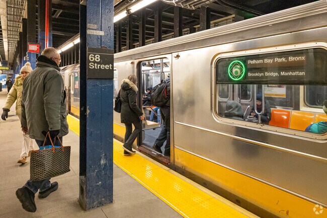 The number 6 train serves the Lenox Hill neighborhood.