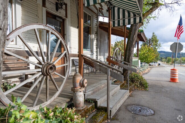 Where Lookingglass Road and Coos Bay Wagon Road meet is the center of town.