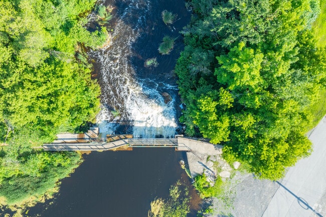 Watch the water flow through the dam at the start of the Boardwalk Loop Trail in Corinna.