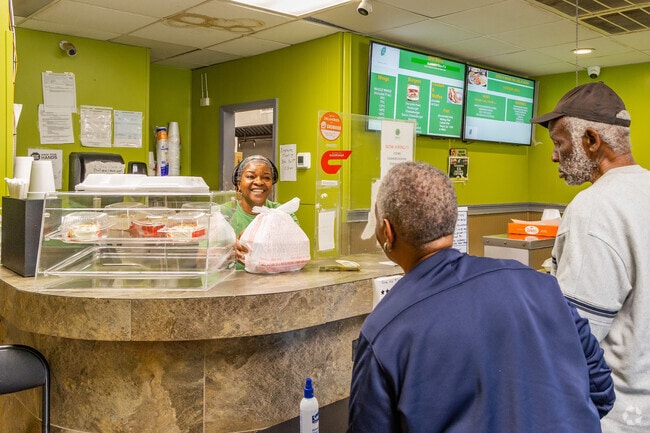 In Bridlewood Zatie's Southern Cuisine patrons enjoy oxtail collard greens and other soul foods.