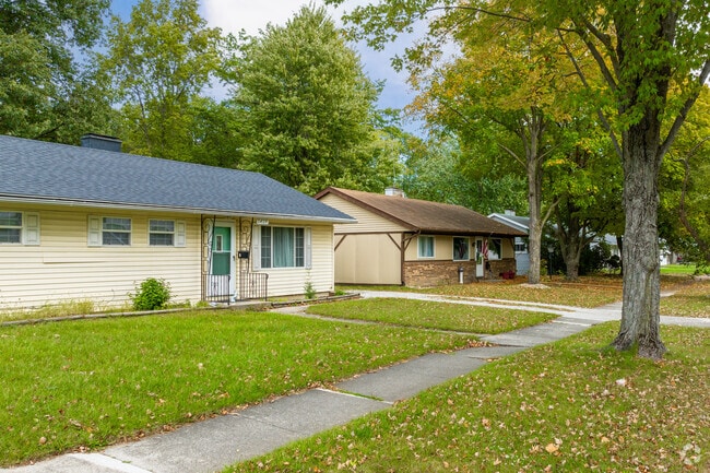 This row of ranches is provided shade by mature trees in Fort Wayne's Hazelwood neighborhood.