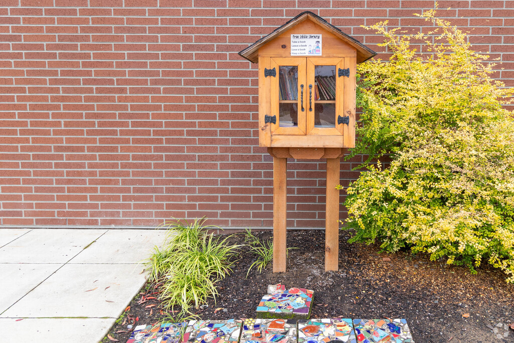 A small library of books waits for students near the front door of Elmira Elementary School.