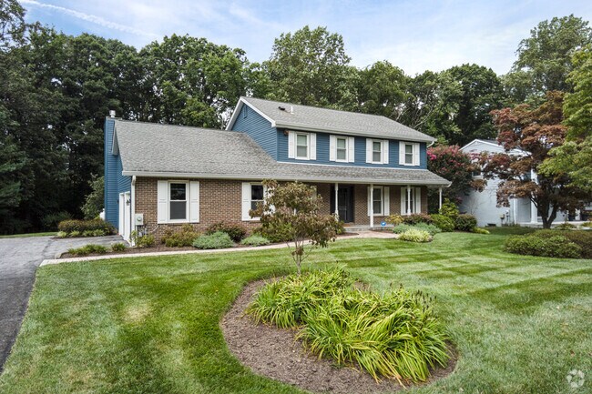 Large colonial-style homes are common throughout the Crownsville neighborhood.