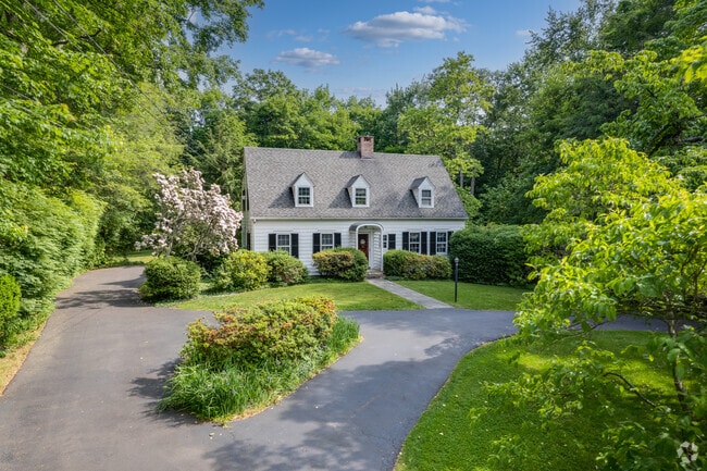 A charming Cape Cod style home located on Saint Marys Lane in Woods Pond.
