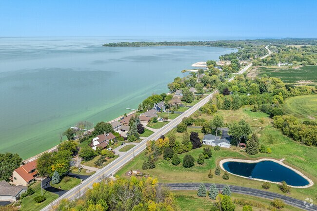 Resident of Nicolet Drive have access to Lake Michigan right off there back porch.