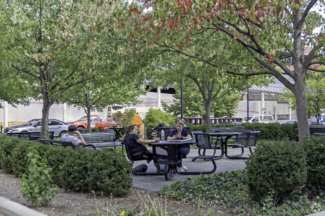 Logantown residents enjoying a beautiful day in the park with friends.
