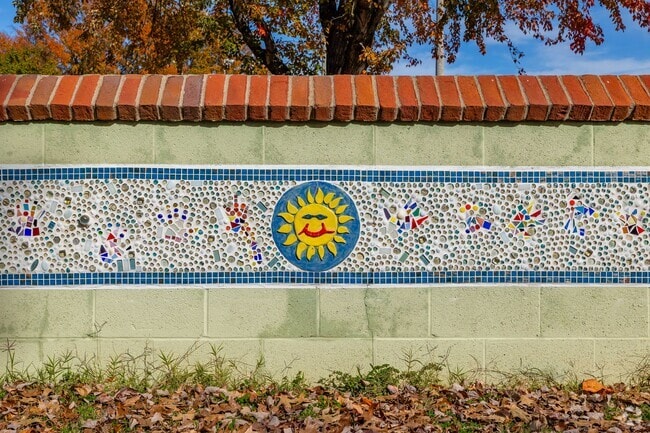 The Memorial Park mosaic is a public art project featuring kids' artwork in Hendersonville.