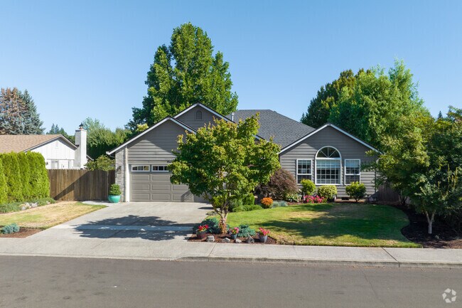 Perfectly potted plants sit in front of this home on NE 20th St in Burton Evergreen.