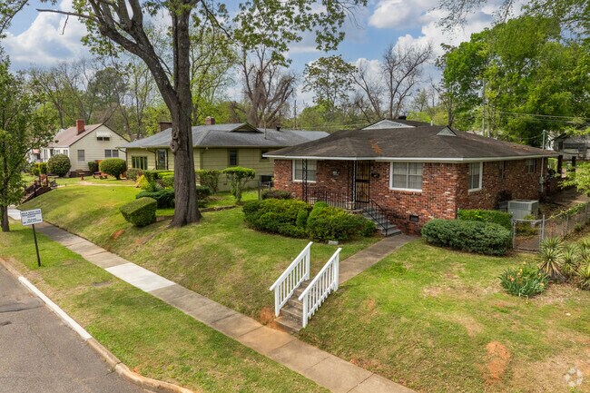 Take a walk and admire the full brick homes of Rising-West Princeton.