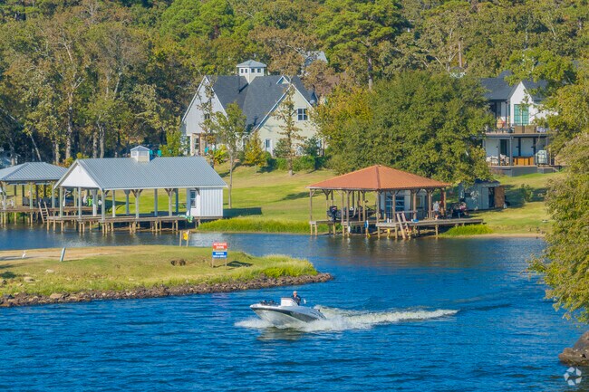 The Villages homeowners have easy access to the lake from their personal boathouses.