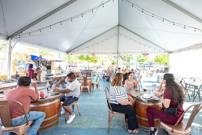 Roseland locals enjoy a late lunch at Mitote Food Park.