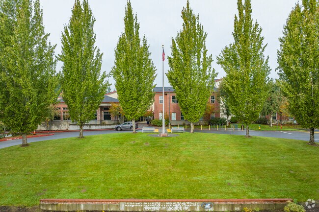 Harbor Ridge Middle School lined with trees for privacy.