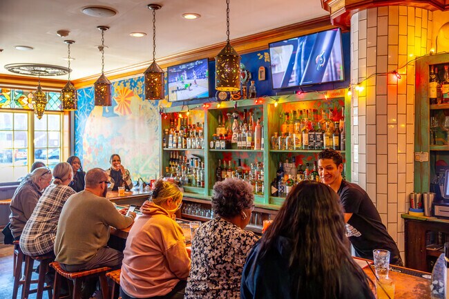 Have some tequila shots or a classic cocktail at the bar at Cantina Feliz in Fairmount.