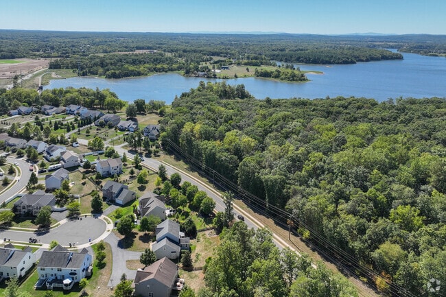 Nature enthusiasts enjoy Kingsbrooke’s tree-lined paths and peaceful surroundings.