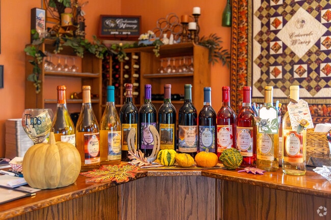 Cedarvale Winery's autumn decor will have you wanting to try a glass of their apple wine.