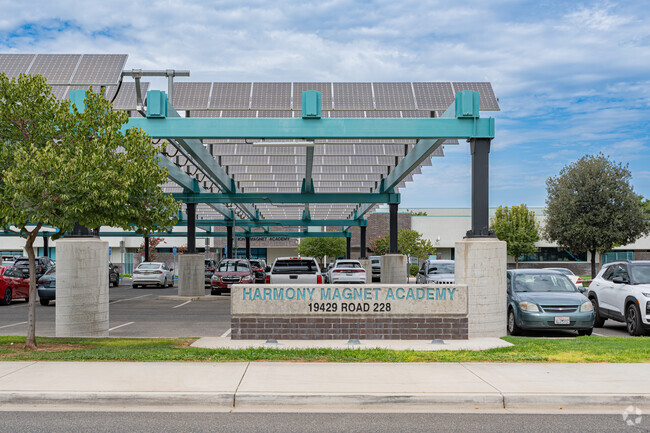 Solar panel covered parking at Harmony Magnet Academy in Strathmore.