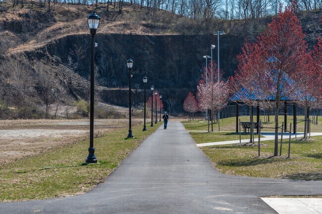 Laurel Hill Park in Secaucus, along with many others give you direct access to hiking trails.