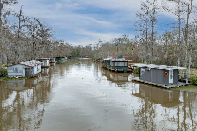 Boat houses dot the bayous that run throughout Kraemer.