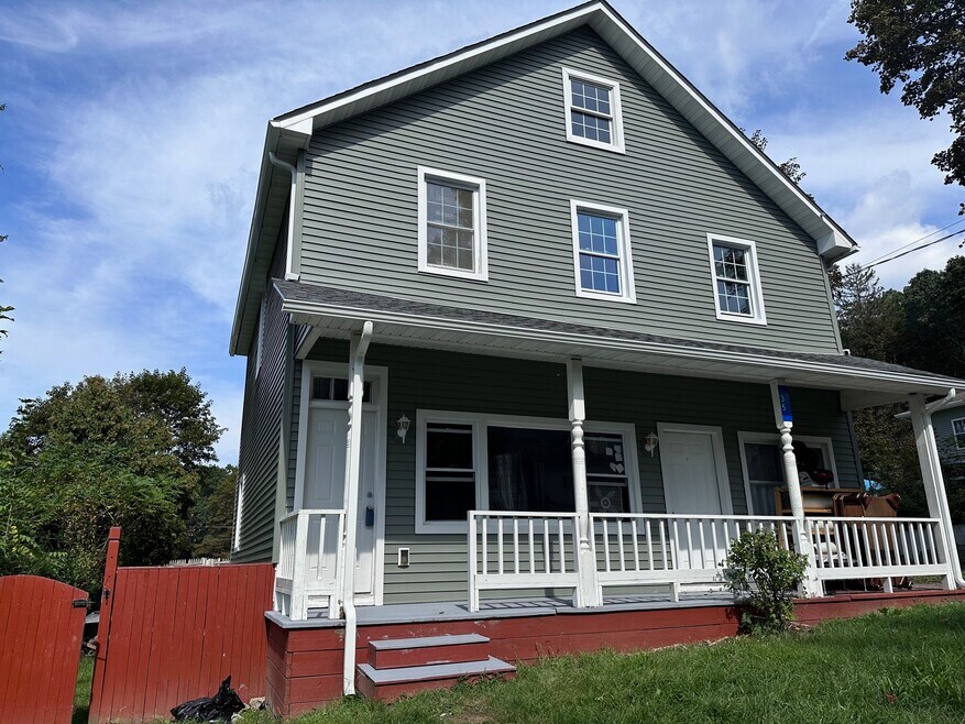 Front of the house, apartment for rent is on the 2nd floor