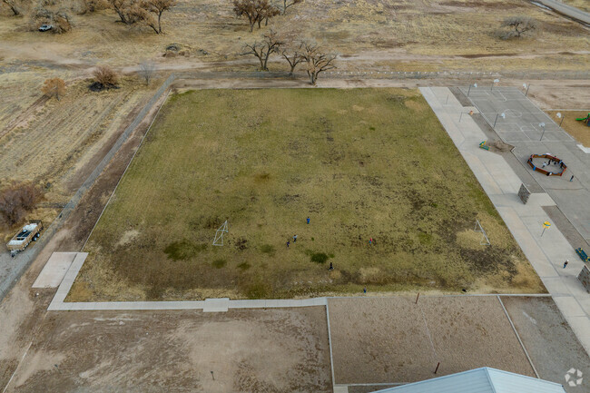 Large grass field at Valencia Elementary School.