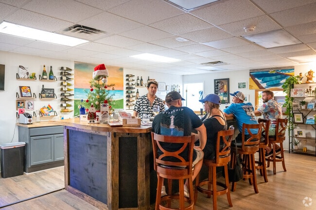 SPI Wine Bar is a cozy, easygoing wine bar with local art displays in South Padre Island.