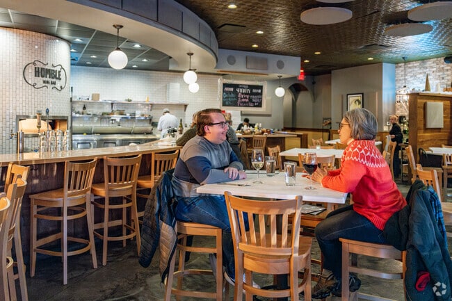 Humble Wine Bar, in Lakewood, is known for their pizza, wine selection, and happy hour.