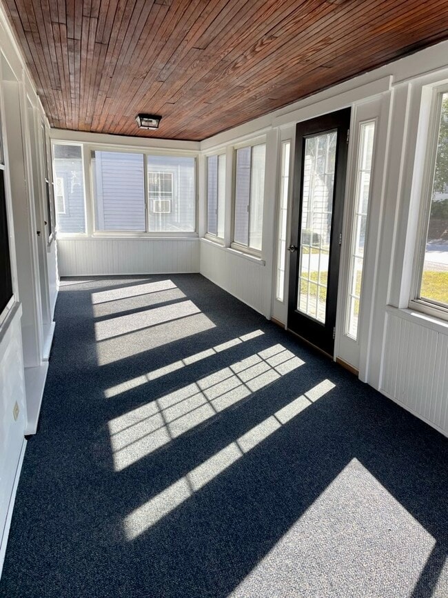 A shared sunporch runs the full length of the home.