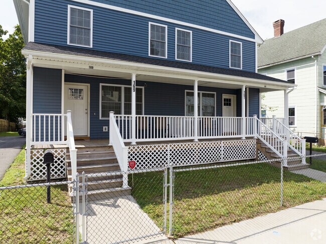 A nice porch on this multifamily home in Old Hill.
