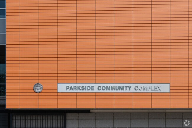 The Parkside School's vibrant orange exterior in Brooklyn.
