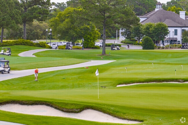Eagle Point Golf Club near Figure 8 Island offers a world-class course and an exclusive haven for golf enthusiasts seeking coastal elegance.