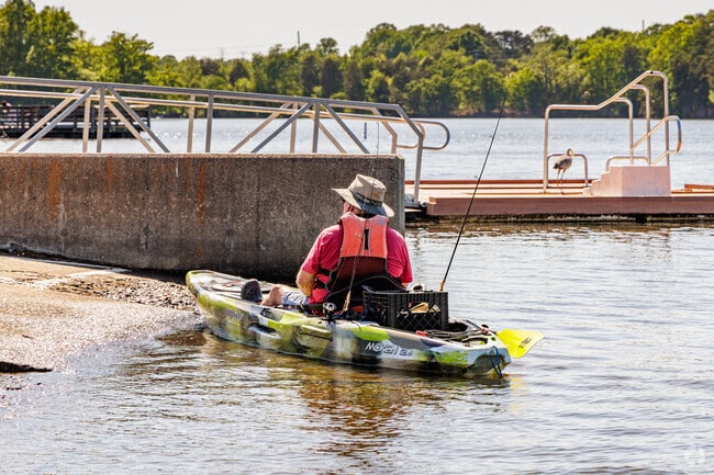 Residents of Johnson Street Park enjoy kayaking and fishing on Oak Hollow Lake.