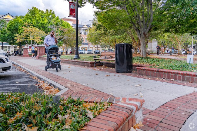 Residents of Royal Lakes enjoy a beautiful evening walk around Gainesville Square.