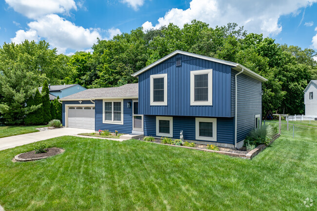 Scattered around Cherry Creek are some split-level homes.