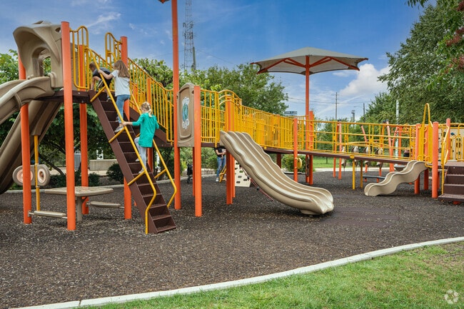 PARK365 features play areas like a treehouse and climbing hills.