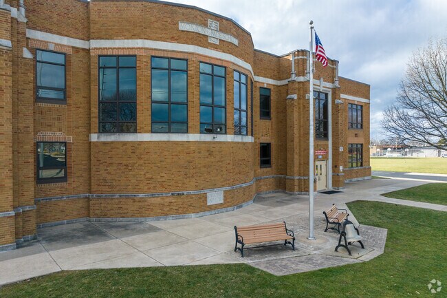 Morton’s Jefferson Elementary School displays classic brick architecture and outdoor seating.