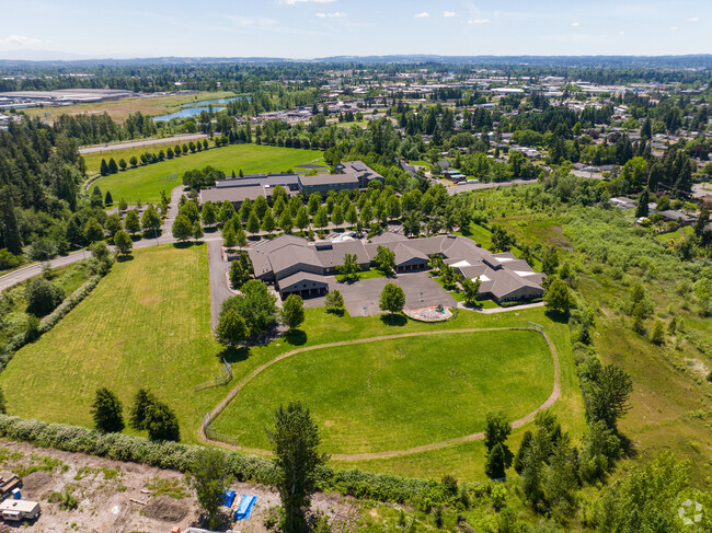 Overview of Weddle Elementary School and the surrounding greenery in Keizer, OR.