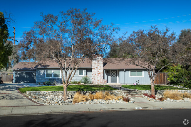 Modest ranch homes with manicured landscaping are found in Old Claremont.