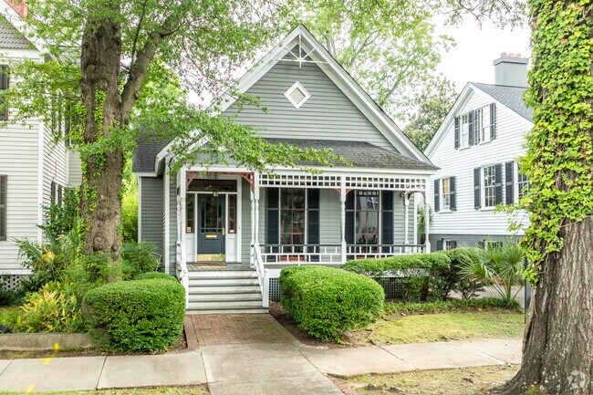 Robert Mills has many Craftsman style homes, which have porches with large overhangs.