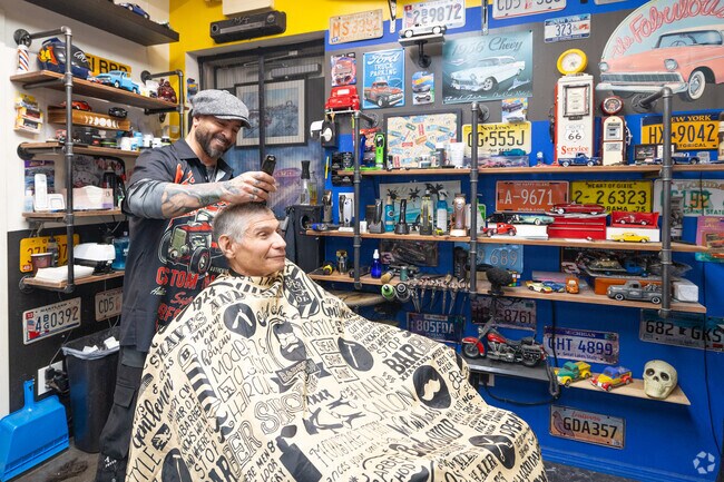 Feel right at home in the stylish barbershop at Vinny's.