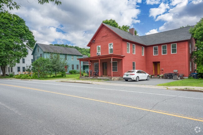 Large farmhouses sit along VT-44 in downtown West Windsor.