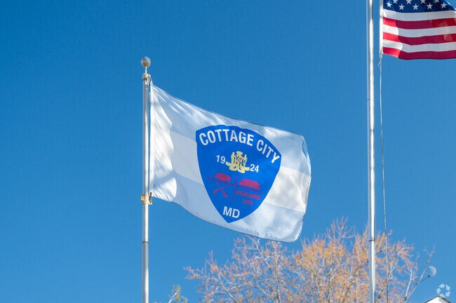 Cottage City's flag waves outside the city hall on Cottage Terrace in Cottage City.