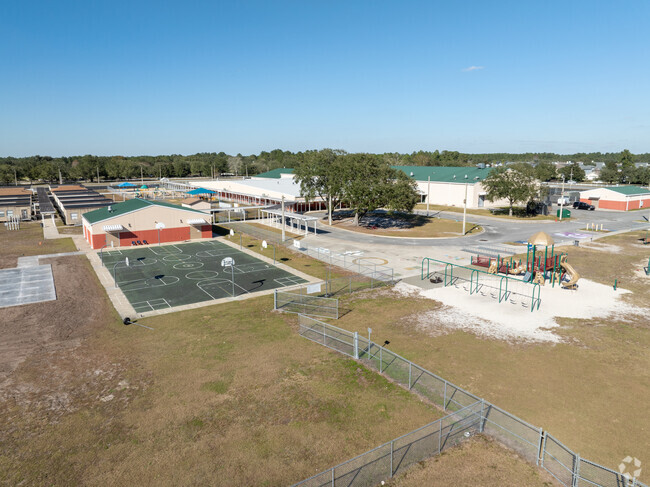Oakleaf Village Elementary boasts plenty of ball court and play area space for children.