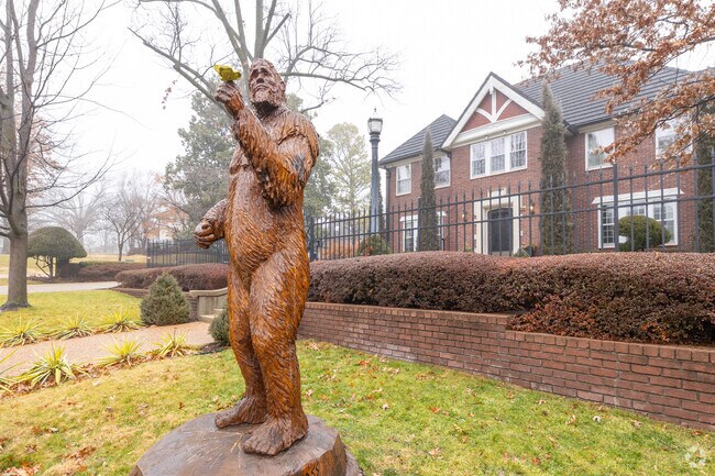 Residents nod to Oklahoma big foot lore with this wood carving in Maple Ridge.