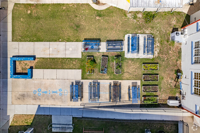 An aerial view of the courtyard of Eustis Elementary School where they grow small gardens.