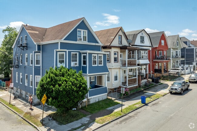 Northside displays colorful New Englander homes with gables and classic multi-family layouts.