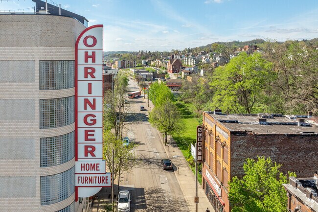 The old Ohringer sign still stands tall in the center of downtown Braddock.