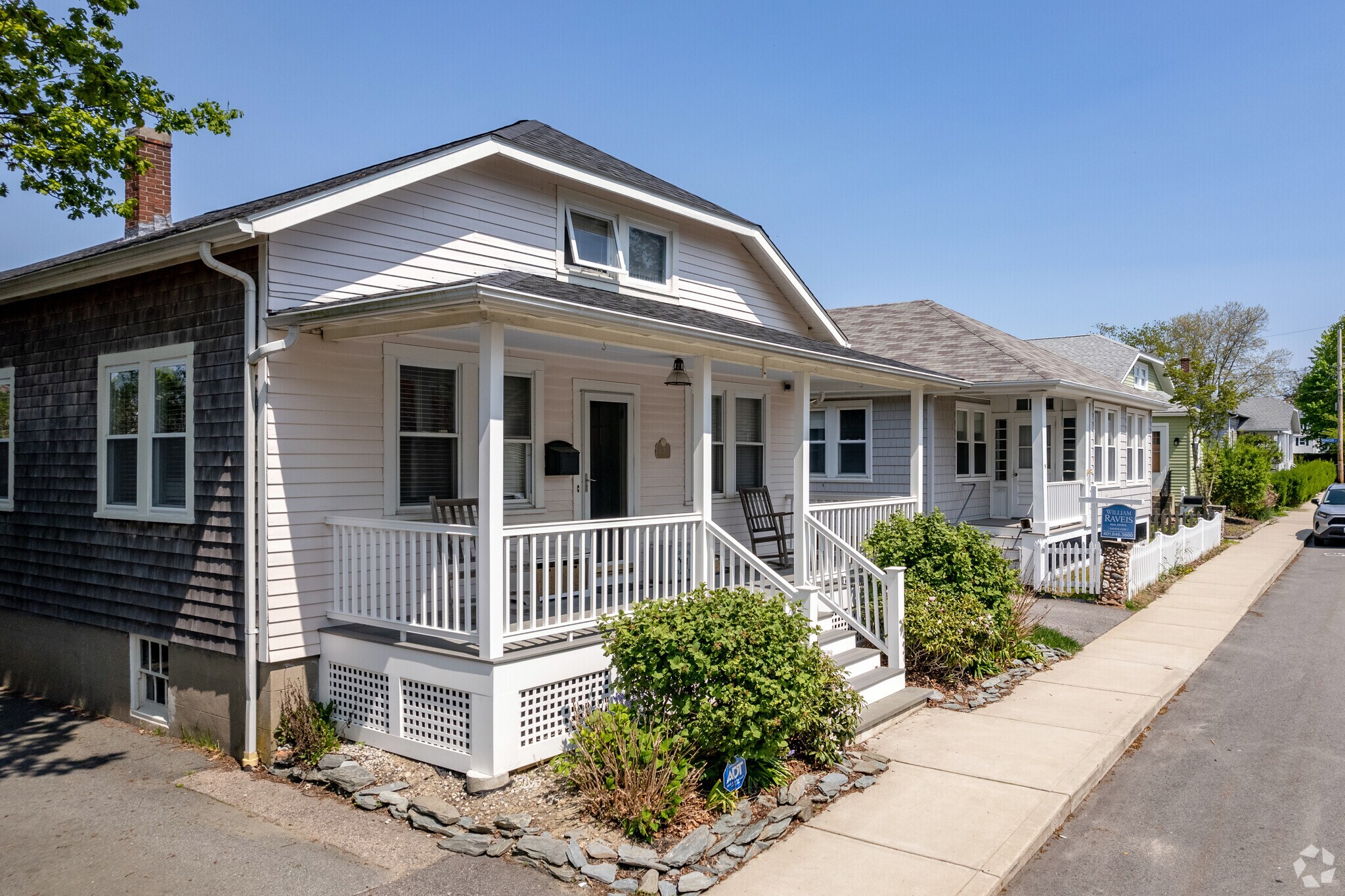 Craftsman style homes with cropped pediments stand in the North End Residential neighborhood.